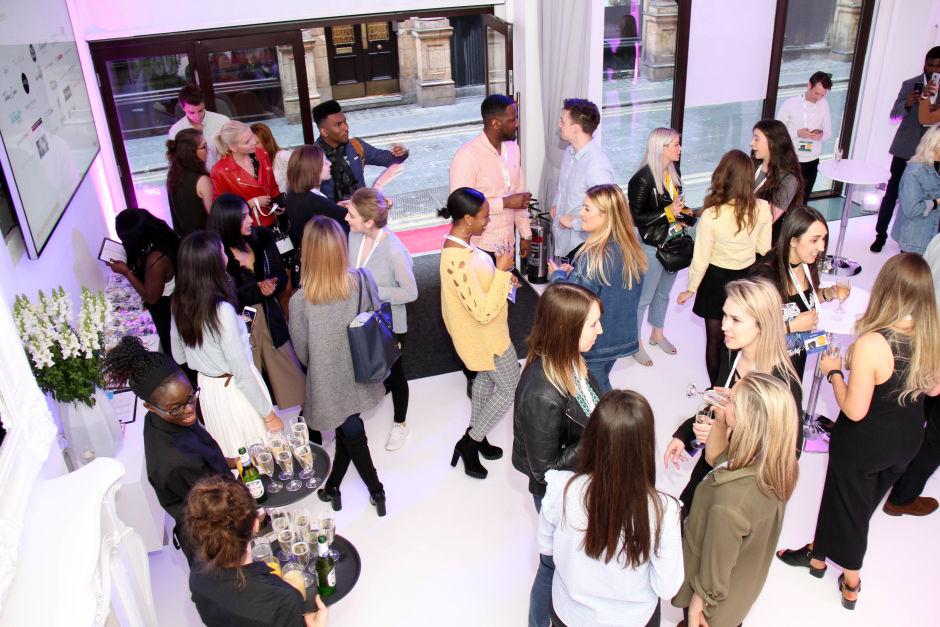 A photo of guests networking at the ICETANK event.