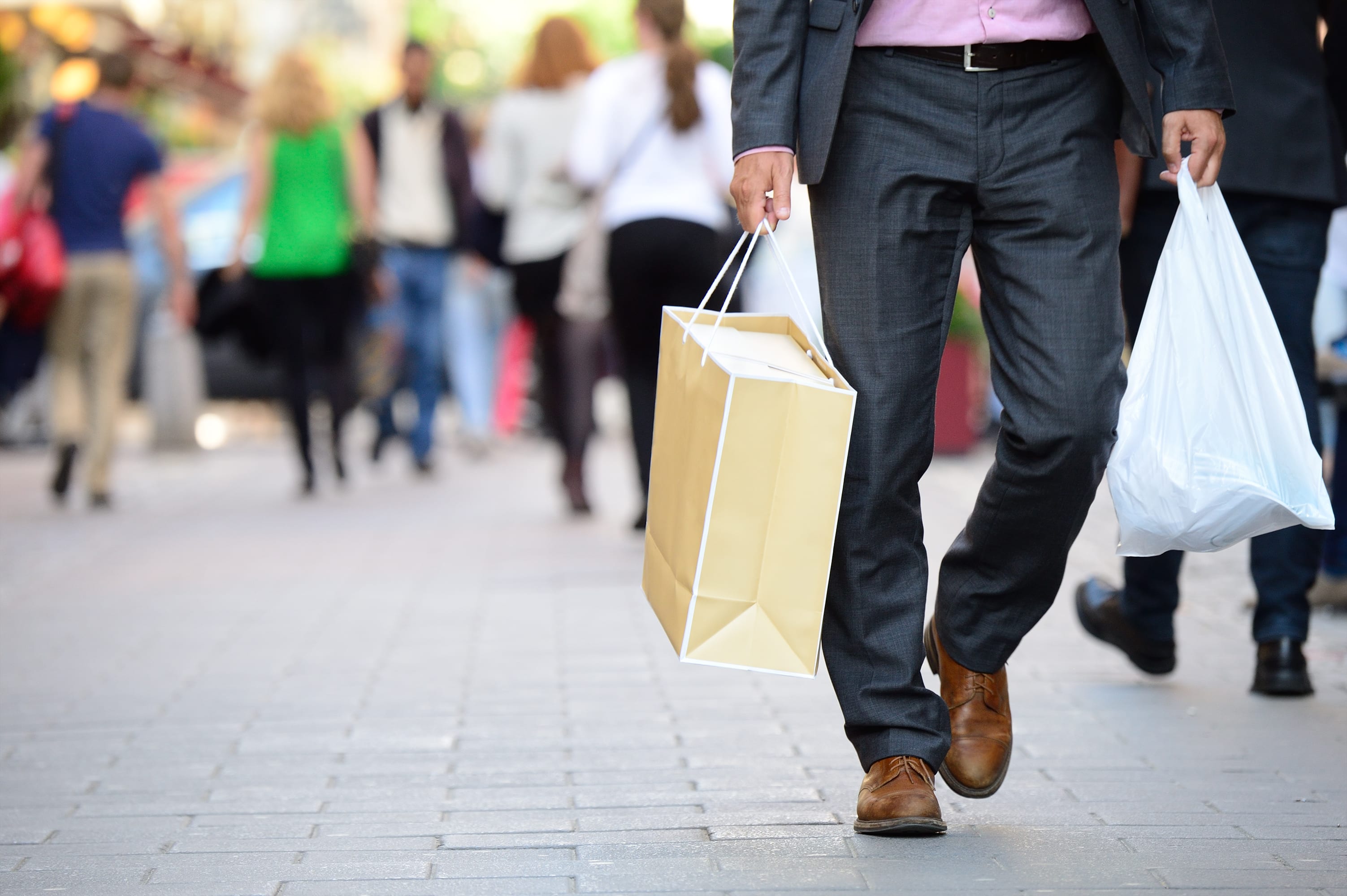Man holding shopping bags affiliate singles day
